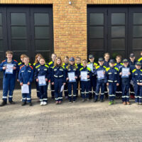 Kinderfeuerwehr bei Brandfloh-Prüfung